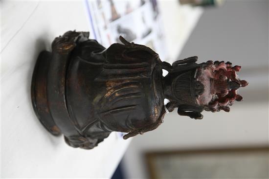 A Chinese late Ming bronze seated figure of a Bodhisattva, and stand, 16th / 17th century, 31.5cm.